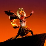 Andile Gumbi as Simba on Pride Rock in the London production of Disney's 'The Lion King' Photo Johan Persson. Copyright Disney