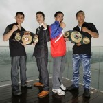 Boxers pose for photos after a news conference in Singapore Boxers pose for photos after a news conference in Singapore
