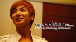 Super Junior Band Leader Leeteuk runs down to the audience to pass the mike personally.