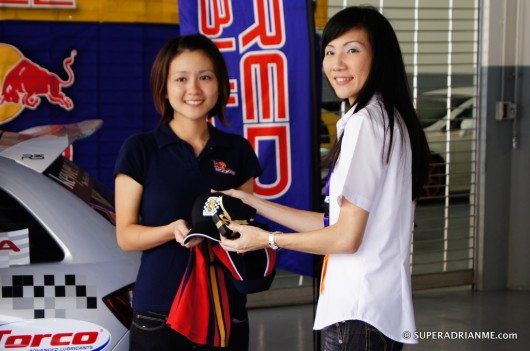 Emilline Ang Getting the Award from Lynn Tan from the Singapore Motor Sports Association