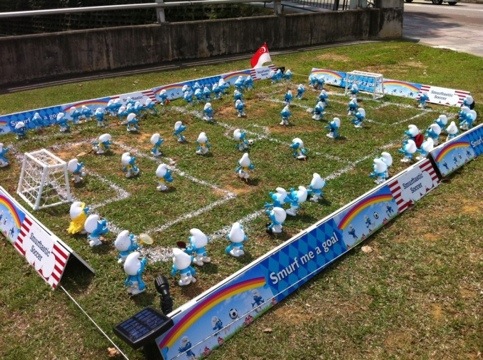 Join the Smurfs for a soccer game at Raffles Place, Handy Road and Scape