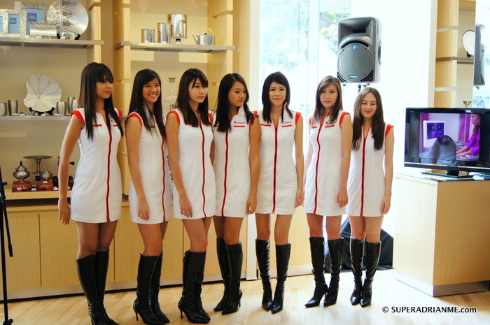 SingTel Grid Girls Posing at the Unveiling of the 2011 SingTel Singapore Grand Prix Grand Trophy