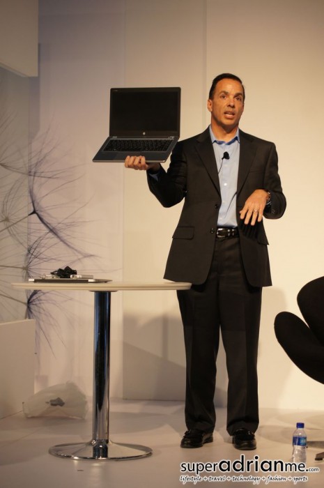 Dan Forlenza, Vice President & General Manager of HP Business Notebooks, showing  the HP Elite Folio Ultrabook can replace an Ultrabook bundled with a stack of dongles
