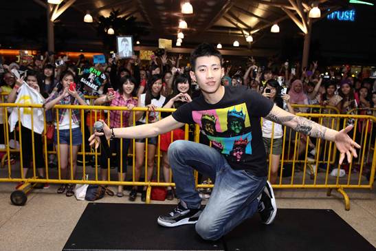 Jay Park posing with fans in backdrop at IMM